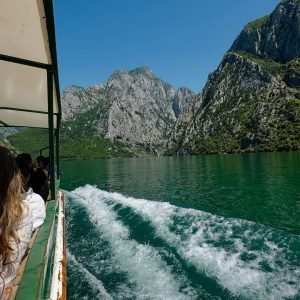 Tirana to Shala River - Scenic Komani Lake boat tour in northern Albania with mountain views